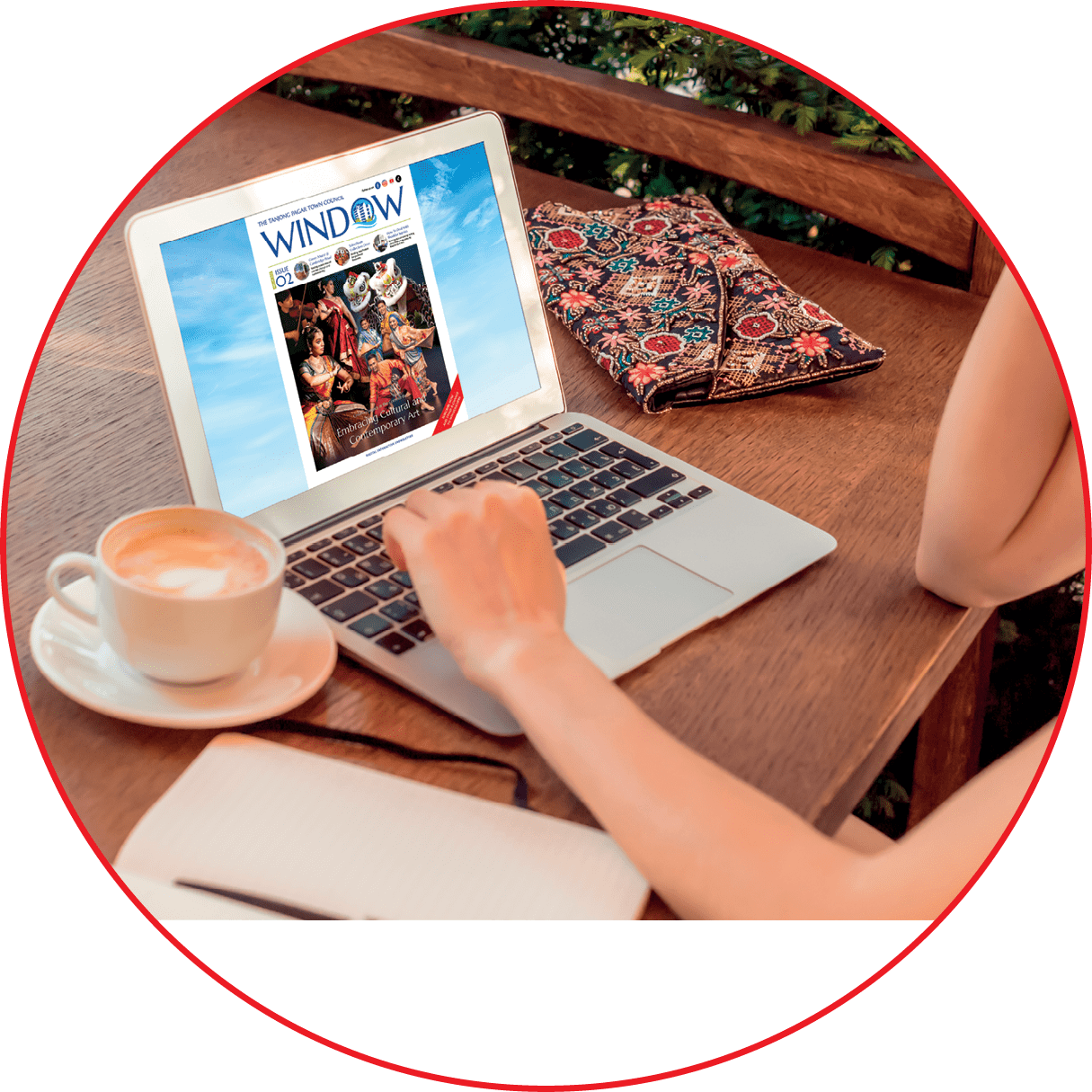 Woman using a laptop during a coffee break